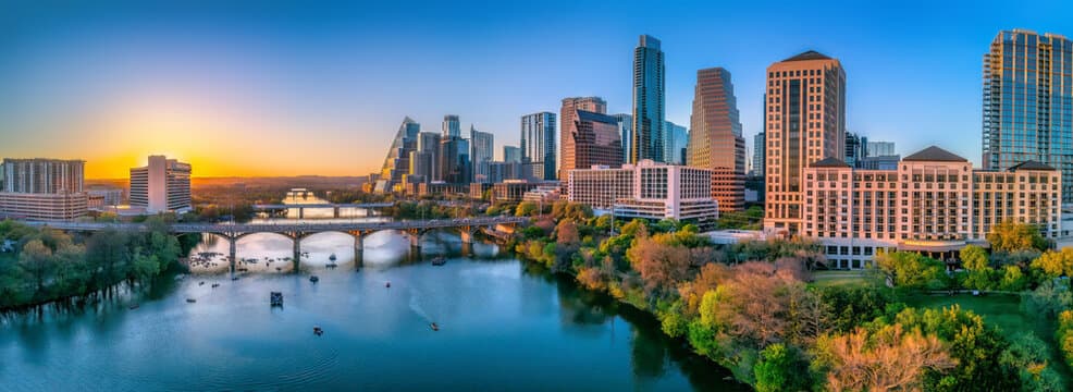 Austin Texas skyline at sunset over Lady Bird Lake